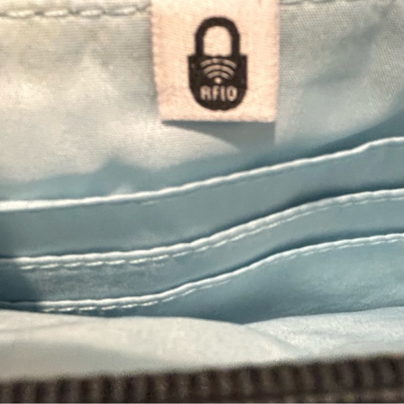 BAGGALLINI Convertible To Sling Multiple Pockets with Safety Wristlet Backpack - Picture 3 of 15